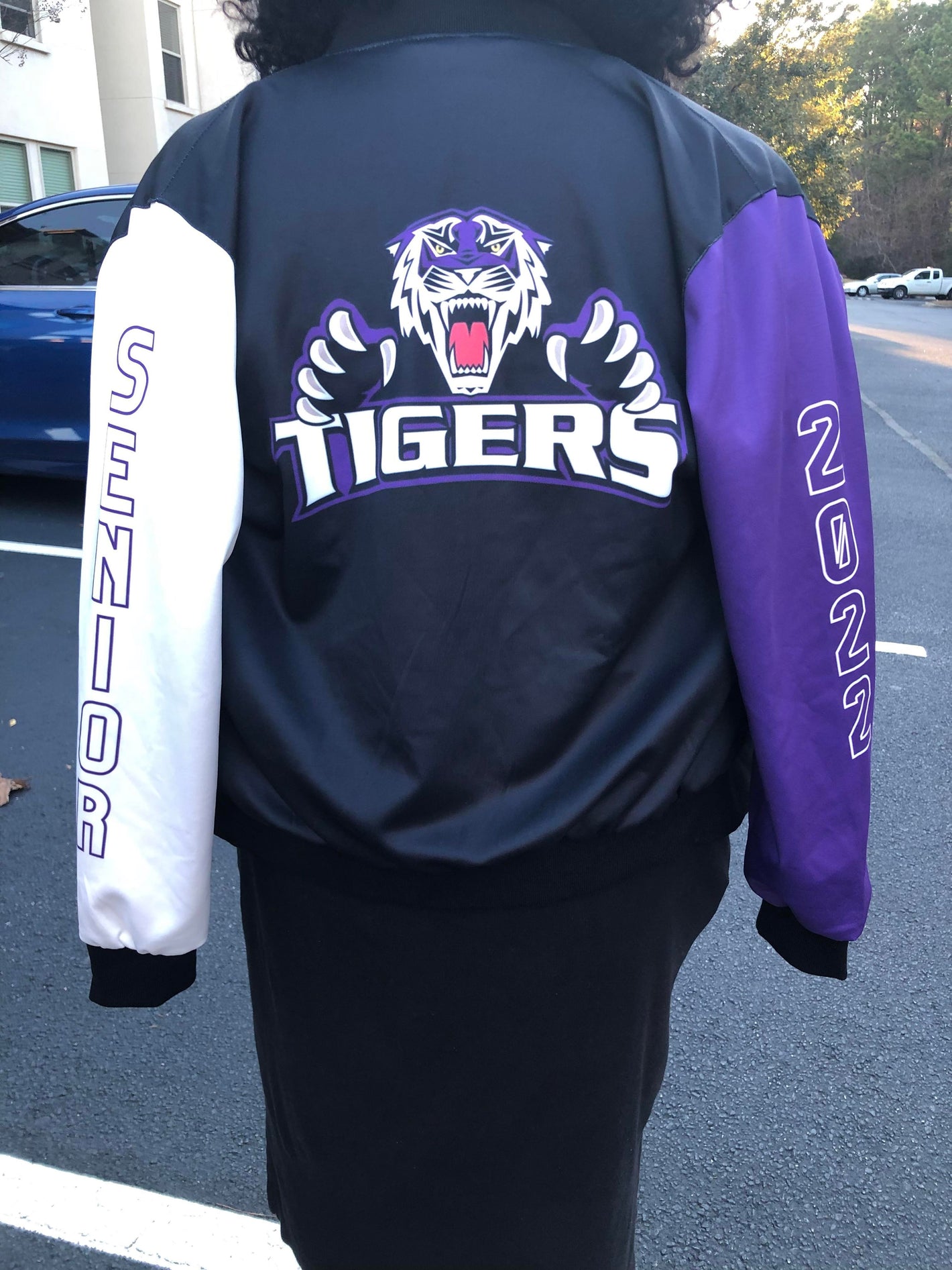 Custom high school and varsity jacket.  Custom varsity mascot jacket. Sample customer custom jacket with branding design.